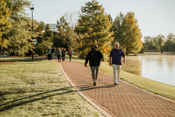 Walk with the President around the lake on the Macon Campus.